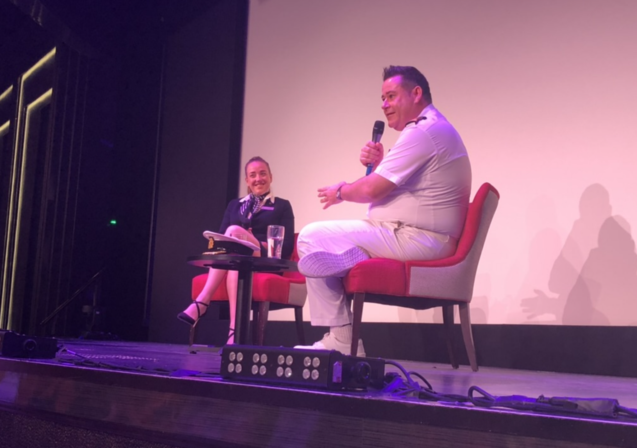 Captain Wesley Dunlop and an entertainment manager on Britannia in 2019.